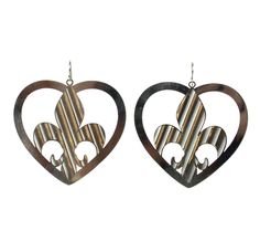 two heart shaped earrings with fleur de lis in the middle and an interlocked design