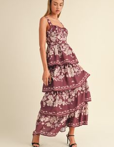 Floral print sleeveless ruched bust tiered maxi dress. Lining. Tiered Ruched Maxi Dress For Garden Party, Tiered Maxi Dress With Smocked Bodice For Garden Party, Wine Floral Dress, Sleeveless Floral Print Tiered Dress For Vacation, Sleeveless Tiered Dress With Floral Print For Vacation, Sleeveless Tiered Dress With Smocked Bodice For Garden Party, Sleeveless Tiered Dress With Floral Print For Garden Party, Sleeveless Floral Print Tiered Dress For Garden Party, Floral Print Tiered Sundress