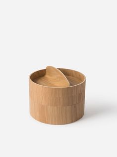 two wooden bowls with spoons in them