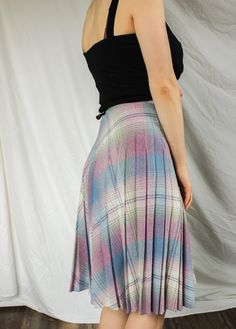 "Beautiful vintage pleated skirt from the 70s. Made by \"The Gang's All Here, New York NY\". Made in USA. Good vintage condition, some light discoloration, pictured. Labeled size 9, fits like a modern size S/M. Please see measurements for accurate fit. Measurements: Length: 27\" Waist: 24\" Hips: 50\" Please message me with any questions about this item. Thank you for visiting Bug B! v i n t a g e b o t t o m s https://www.etsy.com/shop/BugBVintage?section_id=26872169 v i s i t t h e s h o p www Vintage Fitted Flared Pleated Skirt, Vintage Full Skirt With Accordion Pleats, Vintage Pleated Mini Skirt, Vintage Fitted Midi Pleated Skirt, Vintage Pleated Flared Skirt, Vintage Pleated Midi Skirt, Vintage Full Pleated Skirt, Vintage Full Pleated Skirt, Relaxed Fit, Vintage Relaxed Full Pleated Skirt