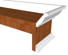 a wooden table with white trim around it