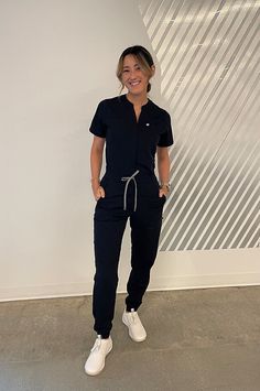 Empower Scrub Jumpsuit - Yitty Fall Scrubs Uniforms, Medical Receptionist Outfit Scrubs, Scrubs Jumpsuit, Fashionable Scrubs, Scrubs Uniform Cute Aesthetic, Rbt Work Outfit Scrubs, Scrub Jacket Outfits, Scrub Uniform Aesthetic, Scrub Jumpsuit