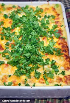 a casserole with cheese, onions and parsley