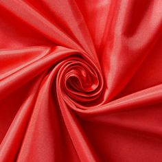 a close up shot of red fabric