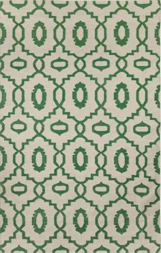 a rug with green and white designs on it