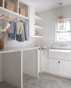 the kitchen is clean and ready to be used as a laundry room or mudroom