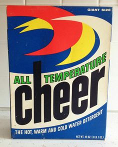 an old box of cheer brand water sitting on a counter next to a tile wall