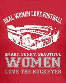 a women's t - shirt with the words real women love football on it