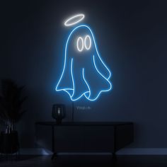 a neon ghost with an angel halo on it's head