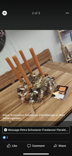 a wooden table topped with candles on top of it