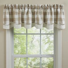 a window with a checkered valance hanging from it's side