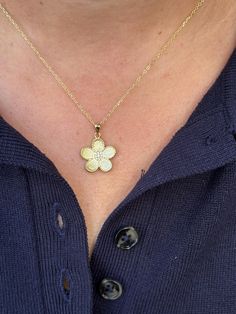 Dainty and a gorgeous brushed gold finish, our flower 🌼 necklace surely stands out! Information: 🌼 Sterling Silver ( 925 stamped ) | 14K Gold Plated 🌼 AAAA+ Cubic Zirconia Gemstones 🌼 Adjustable Length: 16" - 18" 🌼 Hypoallergenic 🌼 Tarnish Resistant Our flower necklace is simply beautiful, it features great craftsmanship and attention to detail from the brushed gold finish to the setting of the gemstones. Each petal has a rope design around the edges, giving the necklace more look and texture. On the center, it has a cluster of Zirconia gemstones that give a great sparkle! The necklace measures 0.75" by 0.60". It's adjustable from 16" - 18", allowing you to create beautiful stacking combinations. This makes a great gift. Gold Flower Necklace, Flower Necklace Gold, Flower Charm Necklace, Necklace Flower, Necklace Diamond, Necklace Minimalist, Rope Design, Flower Fairy, Diamond Flower