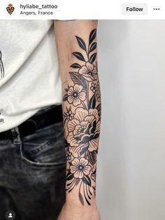 a person with a flower tattoo on their arm