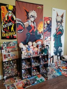 an assortment of anime merchandise on display in a room