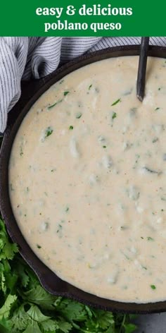 a skillet filled with white sauce and garnished with parsley on the side