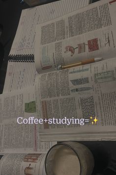 newspapers and a coffee mug on a desk