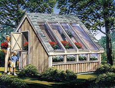 a man and woman standing in front of a small wooden house with plants growing out of the windows