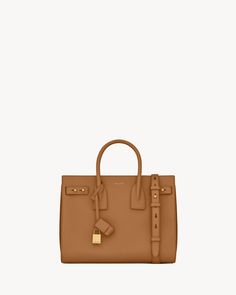 SAC DE JOUR SOUPLE EN CUIR GRAINÉ - small | Saint Laurent | YSL.com Pocket Light, Metal Style, Brass Hardware, Leather Case, Calf Skin, Cinnamon, Zip Pockets, Grain, Saint Laurent