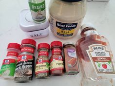 spices and seasonings are sitting on a counter