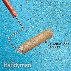 a roller is attached to the wall with an adhesivement stick and plastic loop