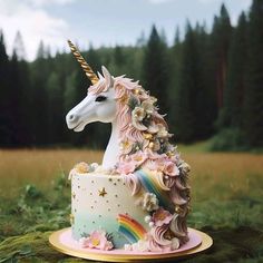 there is a unicorn cake on the table