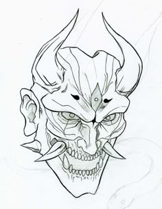 a drawing of a demon with horns and fangs on it's face is shown