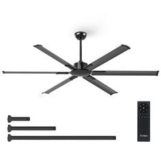 a black ceiling fan with remote control and other items around it on a white background