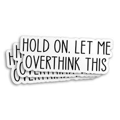 two stickers with the words hold on let me overthik this written in black ink