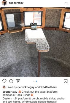 an upside down view of a table and windows in a room with carpeted walls