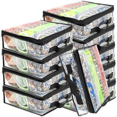 four stacks of money sitting on top of each other in front of a white background