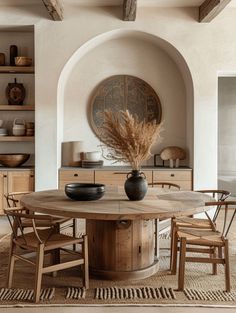 Boho dining room with modern flair featuring eclectic decor and vibrant textures Dessert Interior Design, Bedroom Boho Modern, Coastal Dining Room Ideas, Modern Boho Dining Room, Parisian Dining Room, Parisian Bathroom, Coastal Interior Design, Japandi Bedroom, Mismatched Dining Chairs