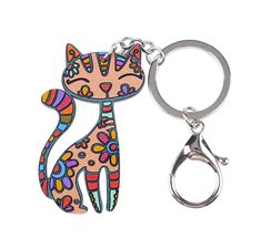 a key chain with a cartoon cat on it's front and back ends are shown