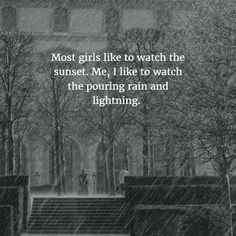 a person walking down the street in the rain with an umbrella over their head and text that reads, most girls like to watch the sunset me, i like to watch