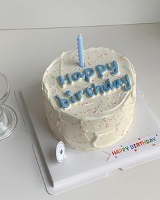 a birthday cake with the words happy birthday written on it