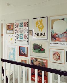 an instagram page with pictures on the wall and below it is a stair rail