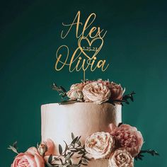 a wedding cake with pink flowers and the words mr and mrs steffenson on top