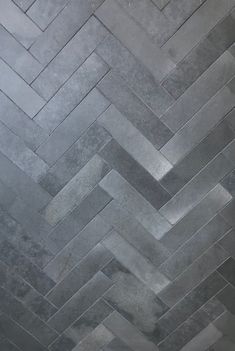 a black and white photo of a tile floor