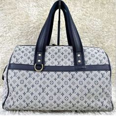 This Authentic Louis Vuitton Josephine Gm Monogram Navy Purse Is A Must-Have For Any Fashion-Forward Woman. The Exterior Is Made Of High-Quality Fabric And Features The Iconic Louis Vuitton Monogram Pattern. The Purse Is Perfect For Everyday Use And Is Sure To Complement Any Outfit. The Brand, Louis Vuitton , Is Known For Its Exceptional Quality And Style, Making This Purse A Great Addition To Any Collection. The Exterior Color Is Navy, Which Adds A Touch Of Elegance To The Purse. The Model Is L Navy Purse, Gm Monogram, Monogram Pattern, Louis Vuitton Bags, Beautiful Bags, Luxury Items, Authentic Louis Vuitton, Louis Vuitton Monogram, Mini Bag