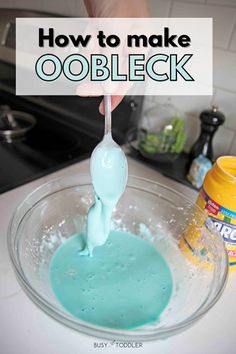 someone is pouring something into a bowl with blue and green liquid in it that says how to make oobleck