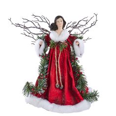 a christmas angel ornament with red dress and white fur on it's chest