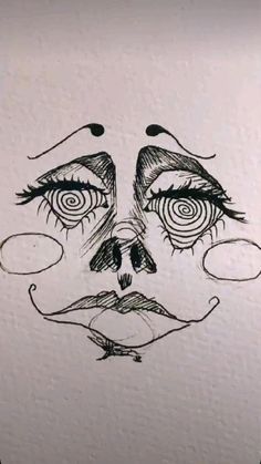 a drawing of a woman's face with her eyes closed and eyebrows drawn in black ink