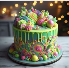 a colorful cake decorated with candy and candies