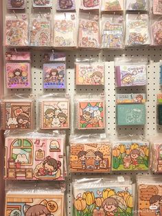 many different kinds of stamps on display in a store