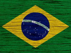 the flag of brazil painted on wooden planks