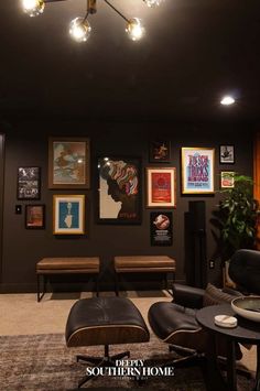 a living room filled with furniture and pictures on the wall