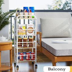 a living room scene with focus on the bed and storage unit for drinks, snacks or condiments