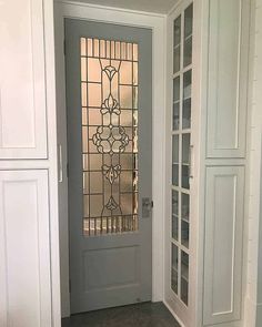 25 Glass Pantry Doors You'll Want to Add to Your Kitchen Now - KnockOffDecor.com Pretty Doors Interior, Fun Pantry Doors, Stained Glass Pantry Door Ideas, Stained Glass Pantry Door, Kitchen Doors To Outside, Pantry Doors With Glass Panels, Glass Pantry Door Ideas, White Pantry Door, Swinging Pantry Door