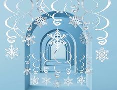 an open door with snowflakes hanging from it's sides, in front of a blue background