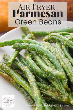 air fryer parmesan green beans on a white plate with text overlay