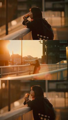 a woman sitting on top of a balcony next to a railing with the sun setting in the background